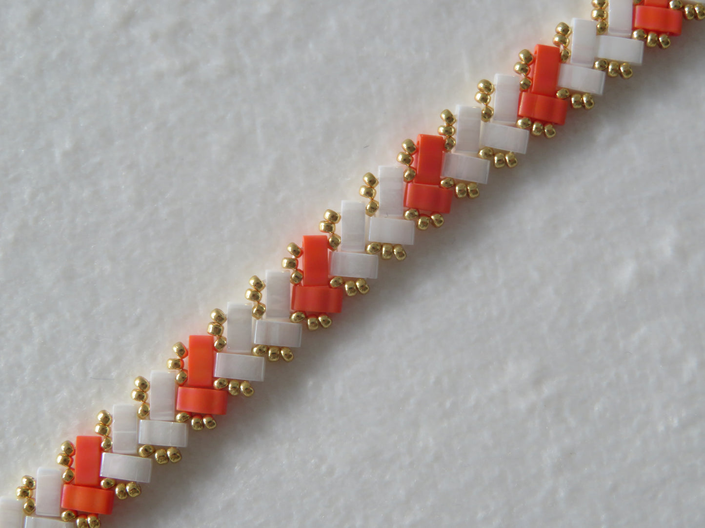 Bracelet 1 rang rayé orange fluo