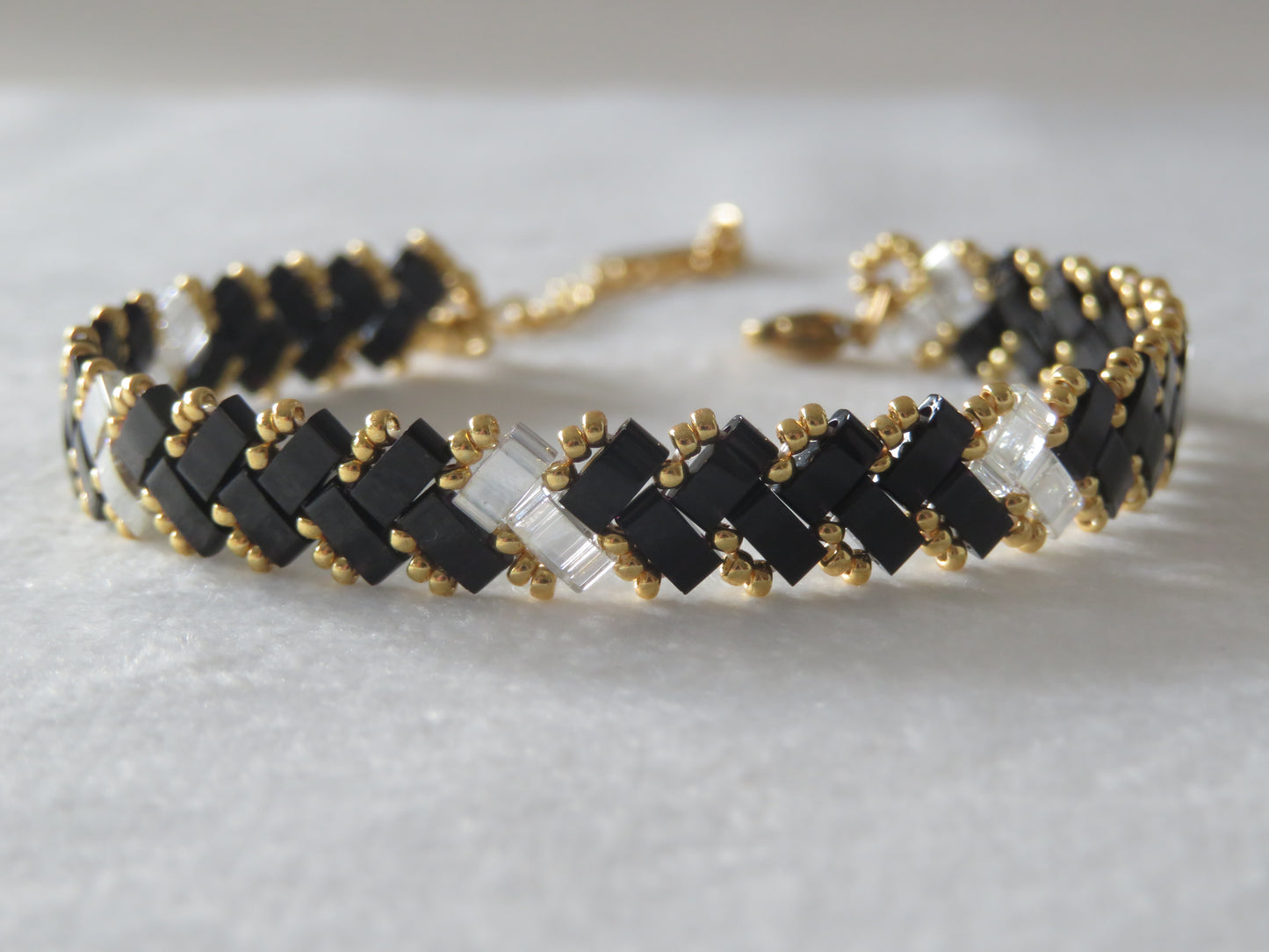 Bracelet 1 rang noir et transparent