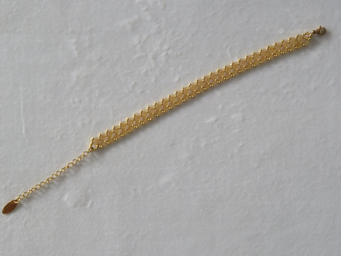 Bracelet 1 rang uni jaune pâle mat