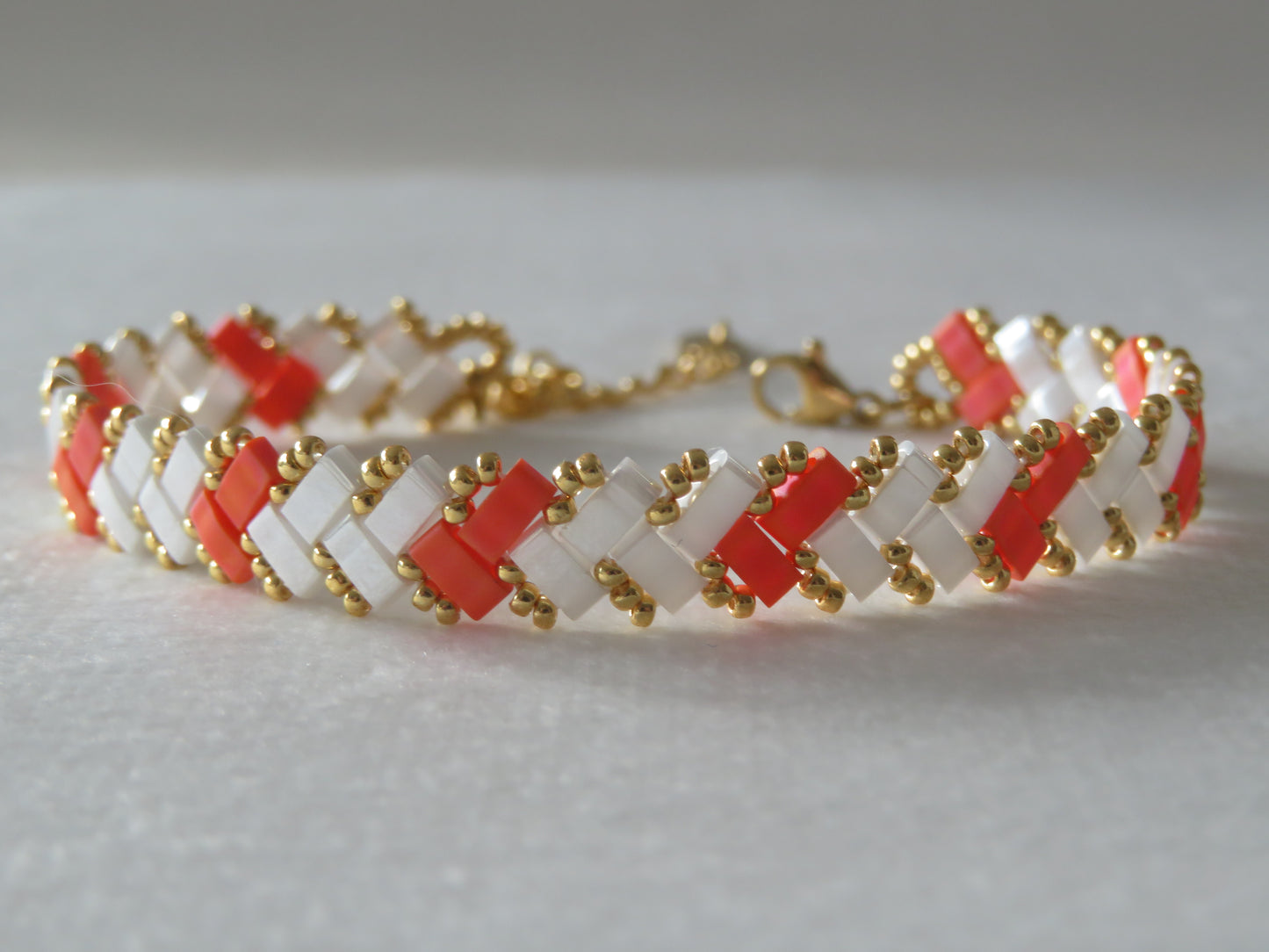 Bracelet 1 rang rayé orange fluo