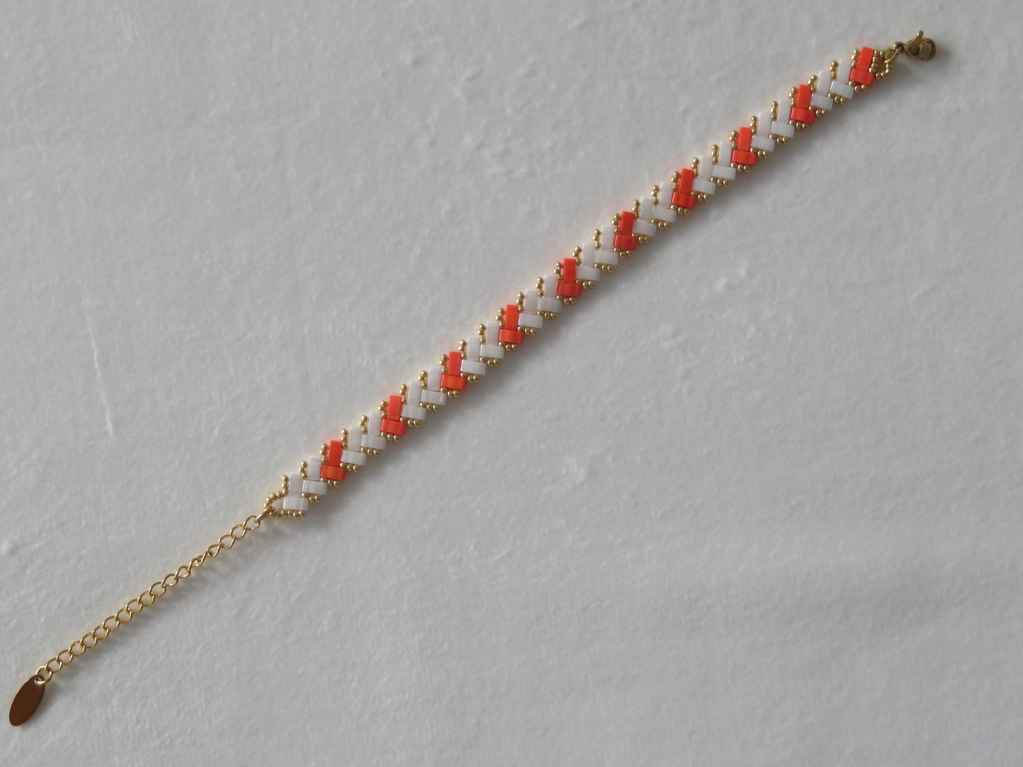 Bracelet 1 rang rayé orange fluo