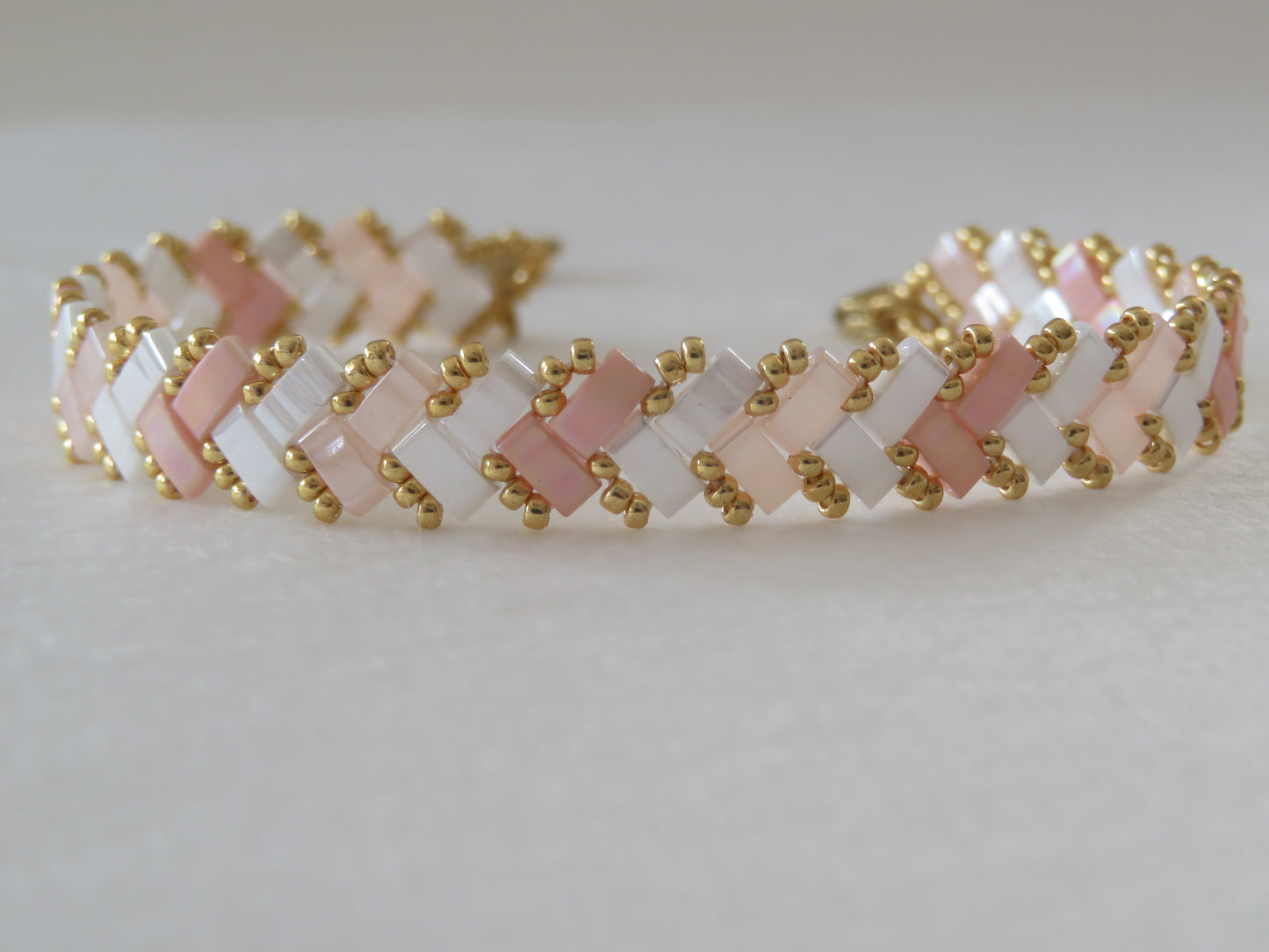 Bracelet 1 rang bicolor rayé rose pale