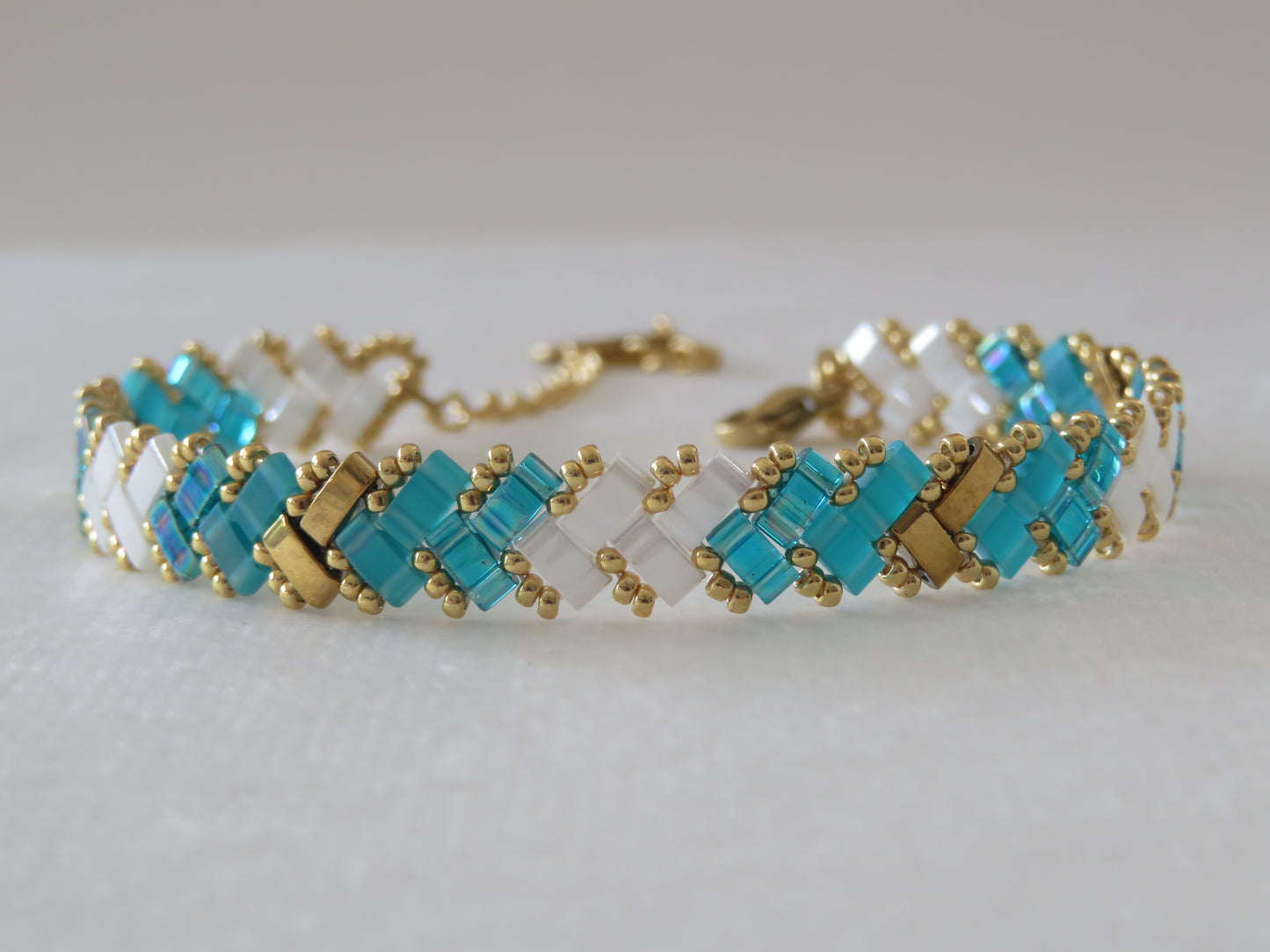 Bracelet 1 rang bicolor sarcelle doré