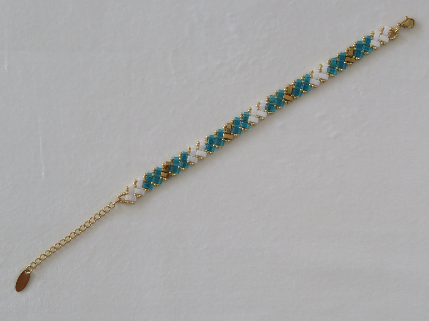 Bracelet 1 rang bicolor sarcelle doré