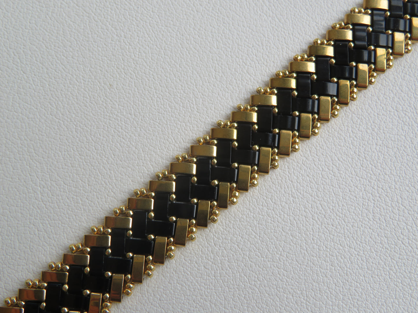 Bracelet 2 rangs noir et doré extérieur