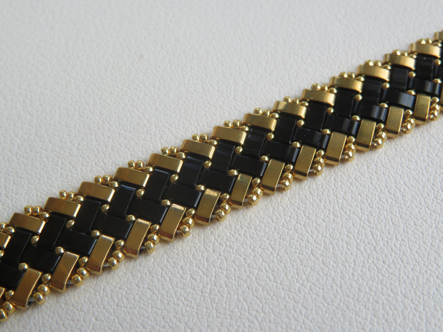 Bracelet 2 rangs noir et doré extérieur