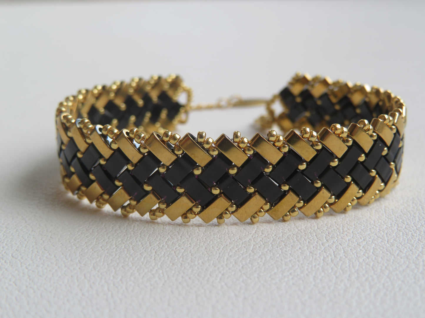 Bracelet 2 rangs noir et doré extérieur