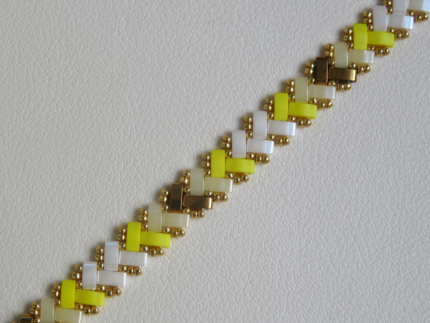 Bracelet Miyuki 1 rang bicolor doré