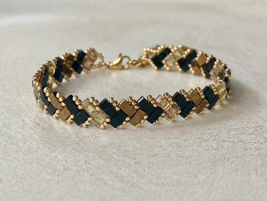 Bracelet 1 rang doré noir et transparent